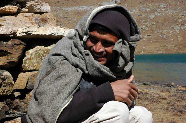 This is our sweet porter, Manooj, who is wrapped up in Lauri's fleece at the very chilly Ice-lake (4600 meter elevation).
