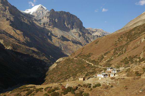 Letdar in the distant valley, with the snow covered Thorong peak seen in the distance.