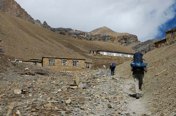 Our final steps to Thorung Phedi High Camp where Manoj runs to greet us and offers to take both of our packs for the final short ascent. We graciously accept :)