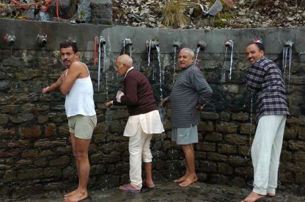 The water flows through 108-taps, shaped like cow-heads. Pilgrims come from all over Nepal and India to receive their sacred blessings, by bathing under each freezing cold stream ... in any weather, cold or hot