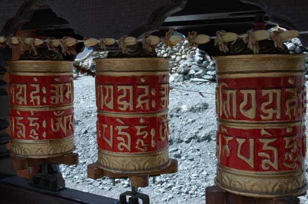 Prayer wheels - often very colourful and beautifully decorated. They contain Buddhist scriptures and prayers, written on paper, within.