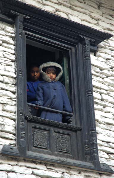 Richly carved window frames in the Takali style, seen in the Tukuche village