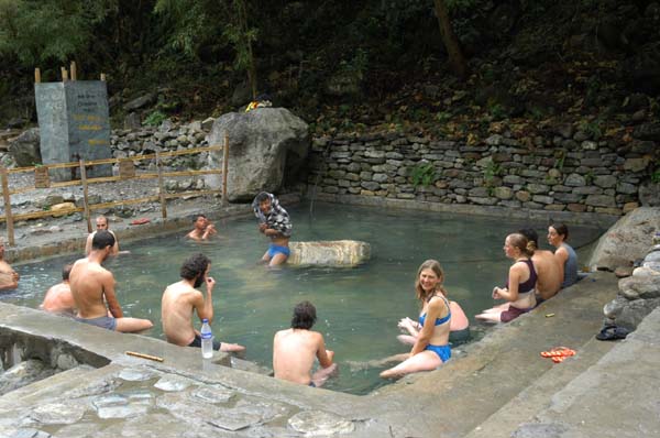 We go for a short and luxurious hot bath after a long days hike. Notice Dawa in the middle, in his jacket :) -- we all had a good laugh together afterwards, when viewing the photo.