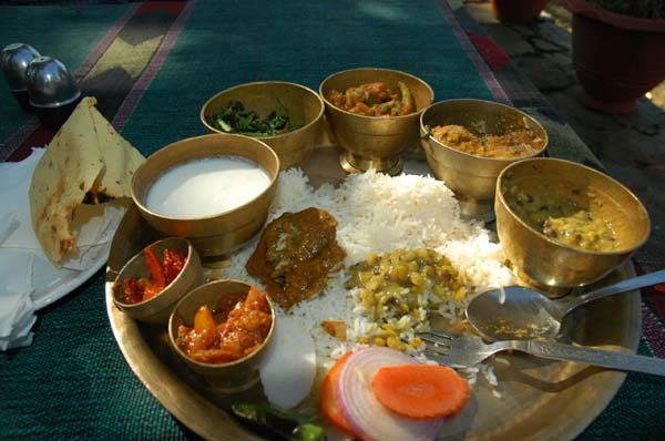 Please enjoy the mouth watering view of this exotic Nepalese Thali. Dhal Bhat is much more interesting in Pokhara! We noticed the many clicks on our previous thali photo :)