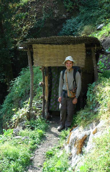 Time for the outhouse ... a bamboo frame over a hole in the ground.