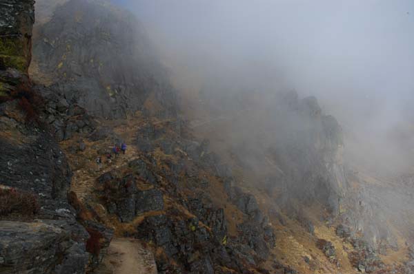 By midday the clouds form and surround us with rolling waves of fog
