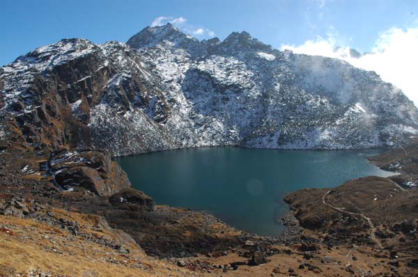 Amazingly, when we arrive at Bhairavkund, the cloud dissapates just long enough for us to get a lovely look at the lake and then reappears as we ascend to Gosainkund