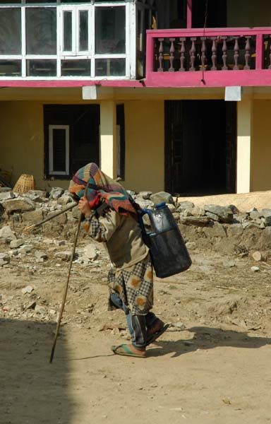 Even the children help out carrying water to their homes