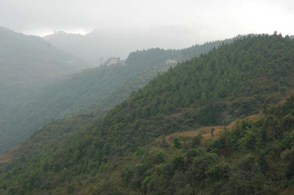 Way off, on the left, we catch a glimpse of the village of Chisopani where we spend the final night on the Helambu trek