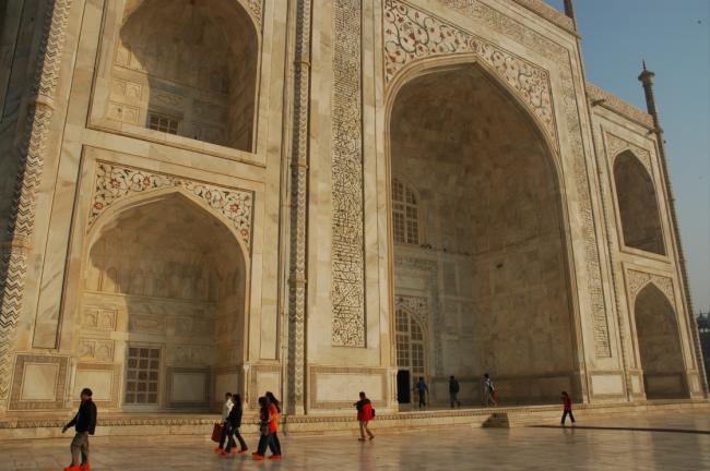 The Taj Mahal, built entirely of white marble, is a stunning architectural beauty beyond description, particulary at dusk and dawn.