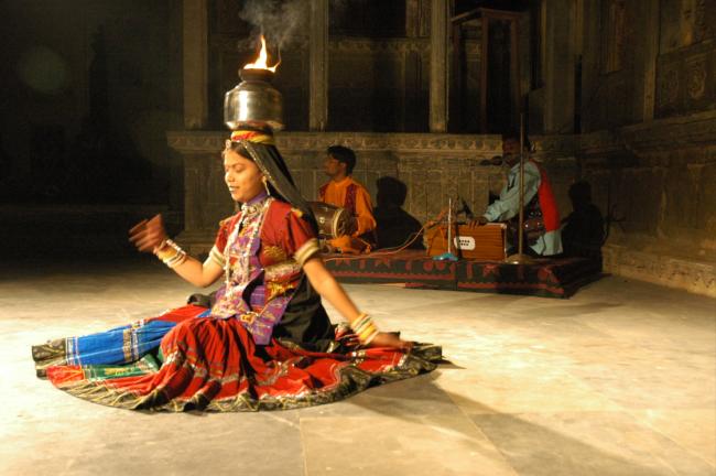 Rajasthani dance performance - fascinating and very entertaining! This woman is dancing with fire on her head.