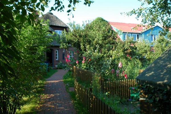 Many of the homes here have traditional thatched roofes and colourful gardens in abundance.